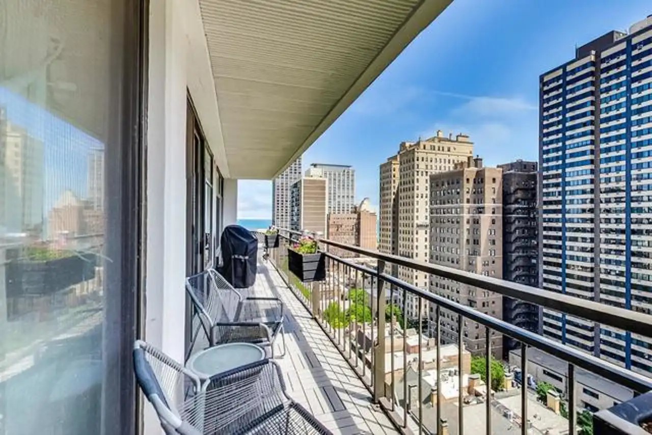 1430 North Astor Street, Unit 19C Chicago, IL 60610 - Photo 26 of 41 a view of balcony with couch