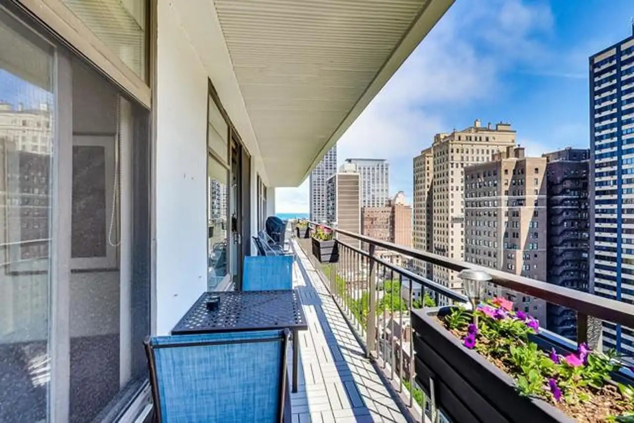 1430 North Astor Street, Unit 19C Chicago, IL 60610 - Photo 27 of 41 a view of balcony with outdoor seating