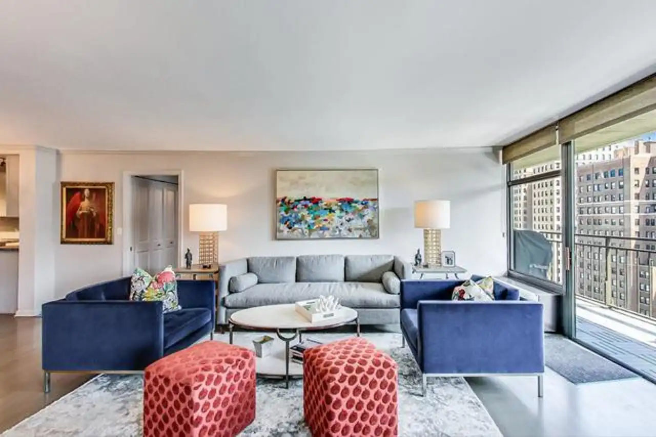 1430 North Astor Street, Unit 19C Chicago, IL 60610 - Photo 3 of 41 a living room with furniture and a rug