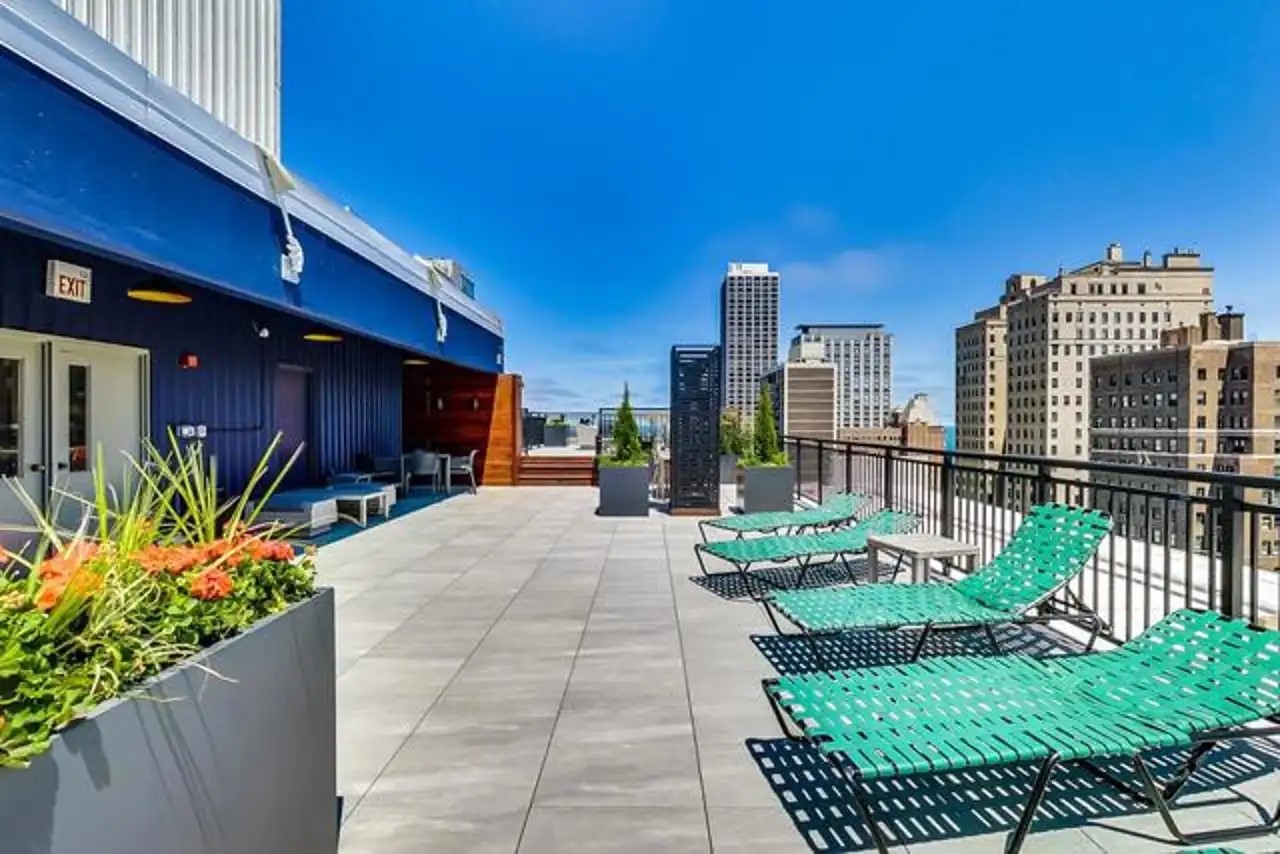 1430 North Astor Street, Unit 19C Chicago, IL 60610 - Photo 34 of 41 a view of a balcony with chairs