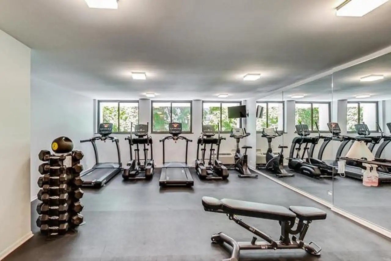 1430 North Astor Street, Unit 19C Chicago, IL 60610 - Photo 35 of 41 a view of a room with gym equipment