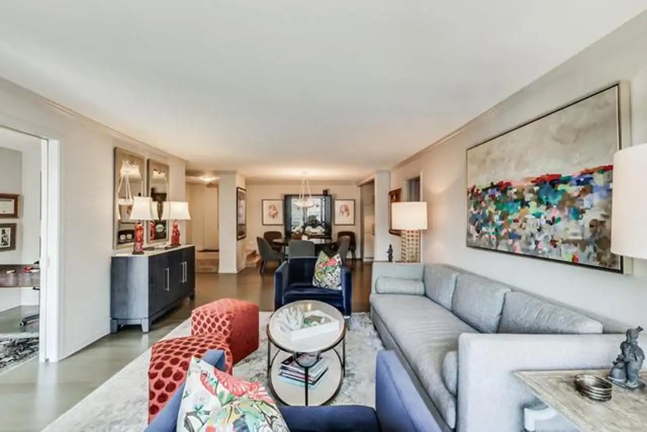 1430 North Astor Street, Unit 19C Chicago, IL 60610 - Photo 5 of 41 a living room with furniture and a wooden floor