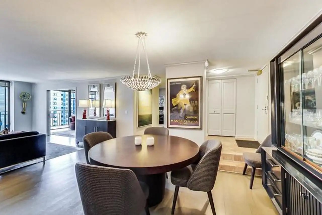 1430 North Astor Street, Unit 19C Chicago, IL 60610 - Photo 6 of 41 a dining room with furniture and window