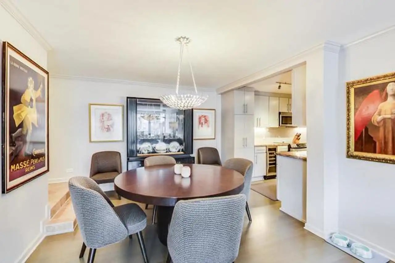 1430 North Astor Street, Unit 19C Chicago, IL 60610 - Photo 8 of 41 a dining room with furniture and window