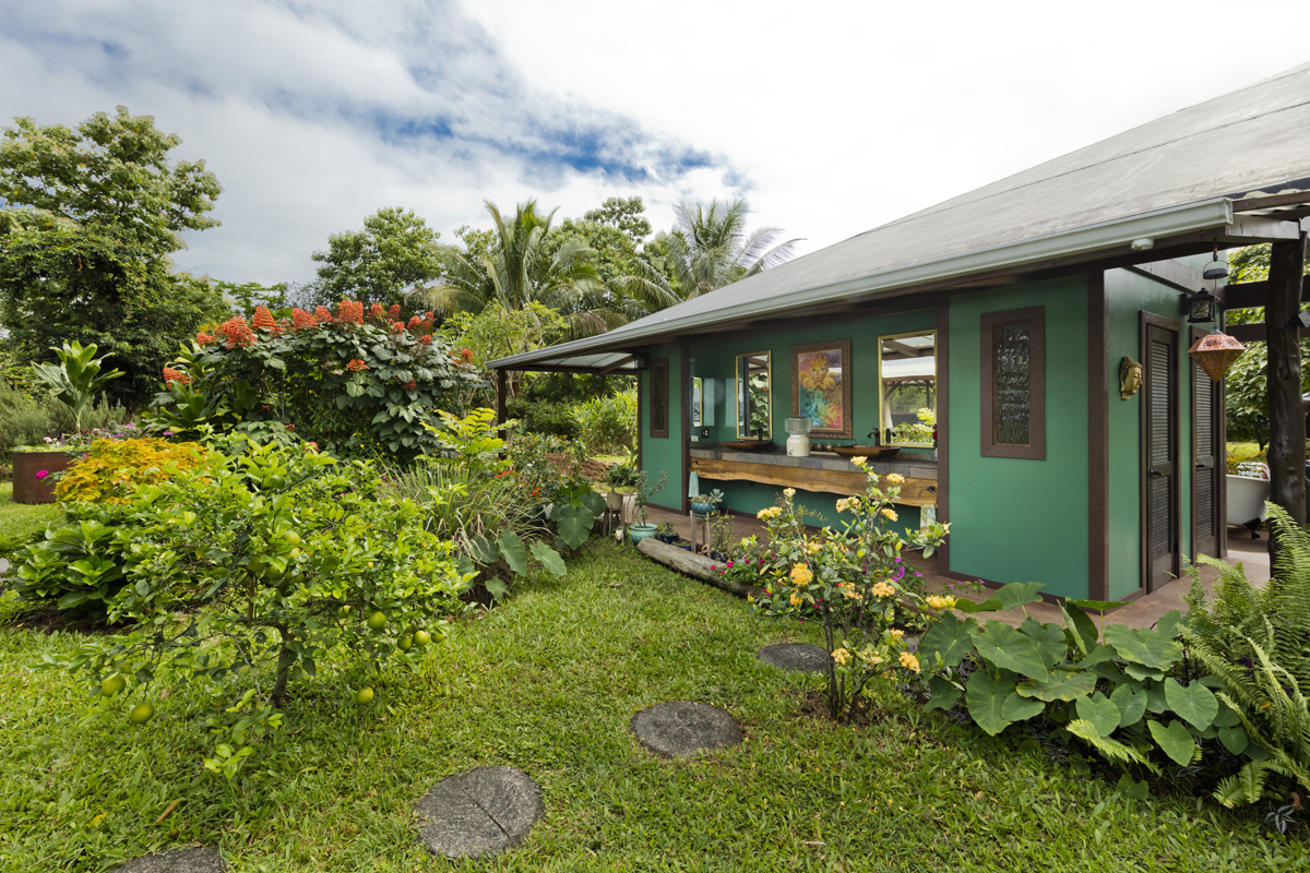 13-353 Kamaili Road Pahoa, HI 96778 - Photo 17 of 30 a front view of a house with garden