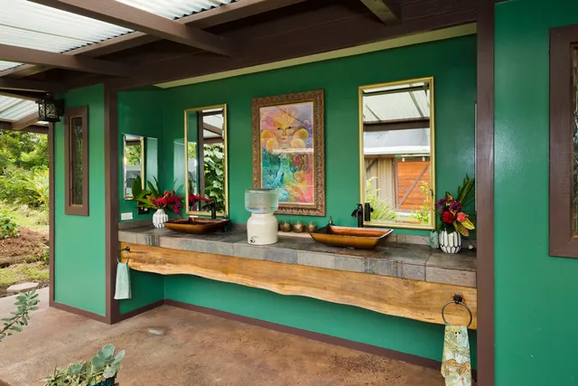 a bathroom with a toilet and shower