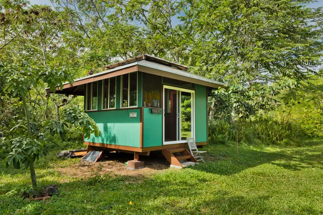 a balcony view with a seating space