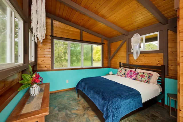 a view of a mini house with a yard