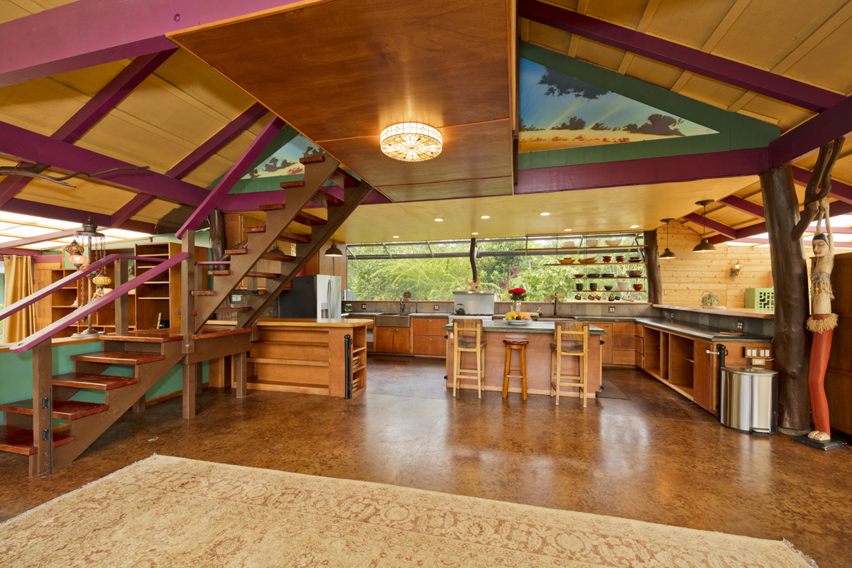 13-353 Kamaili Road Pahoa, HI 96778 - Photo 5 of 30 a dining room with wooden floor furniture and a large window