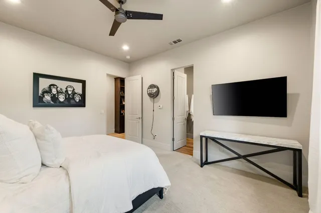 a bathroom with a sink a mirror and a window