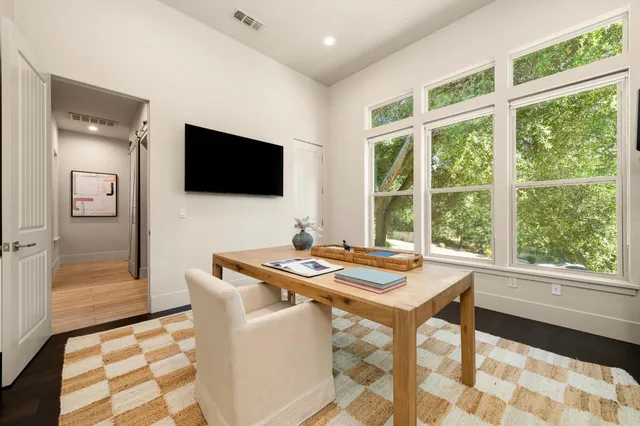 a large white building with a large window