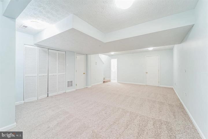 11 Gemstone Court Baltimore, MD 21244 - Photo 17 of 19 a view of an empty room