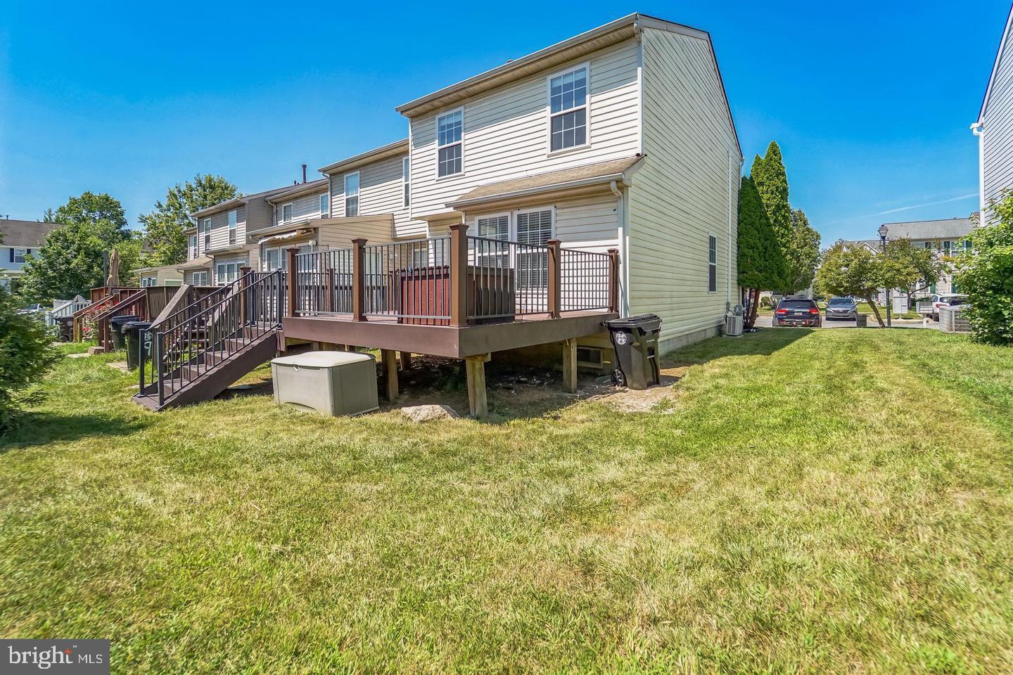 11 Gemstone Court Baltimore, MD 21244 - Photo 19 of 19 a view of a house with backyard porch and sitting area