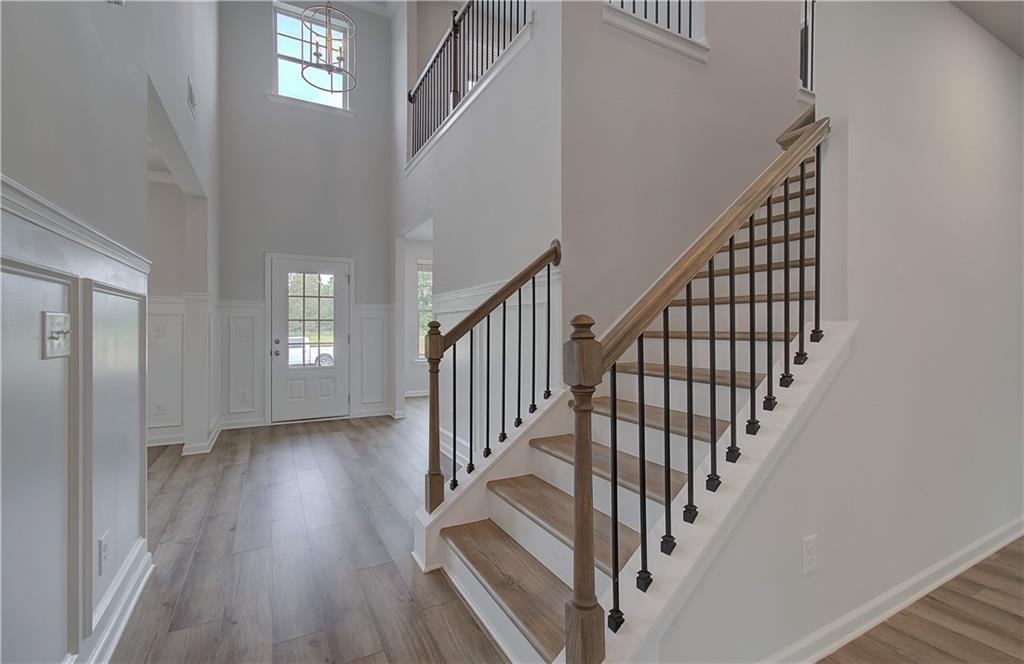 116 Haverling Pass Hampton, GA 30228 - Photo 9 of 38 a view of entryway with wooden floor