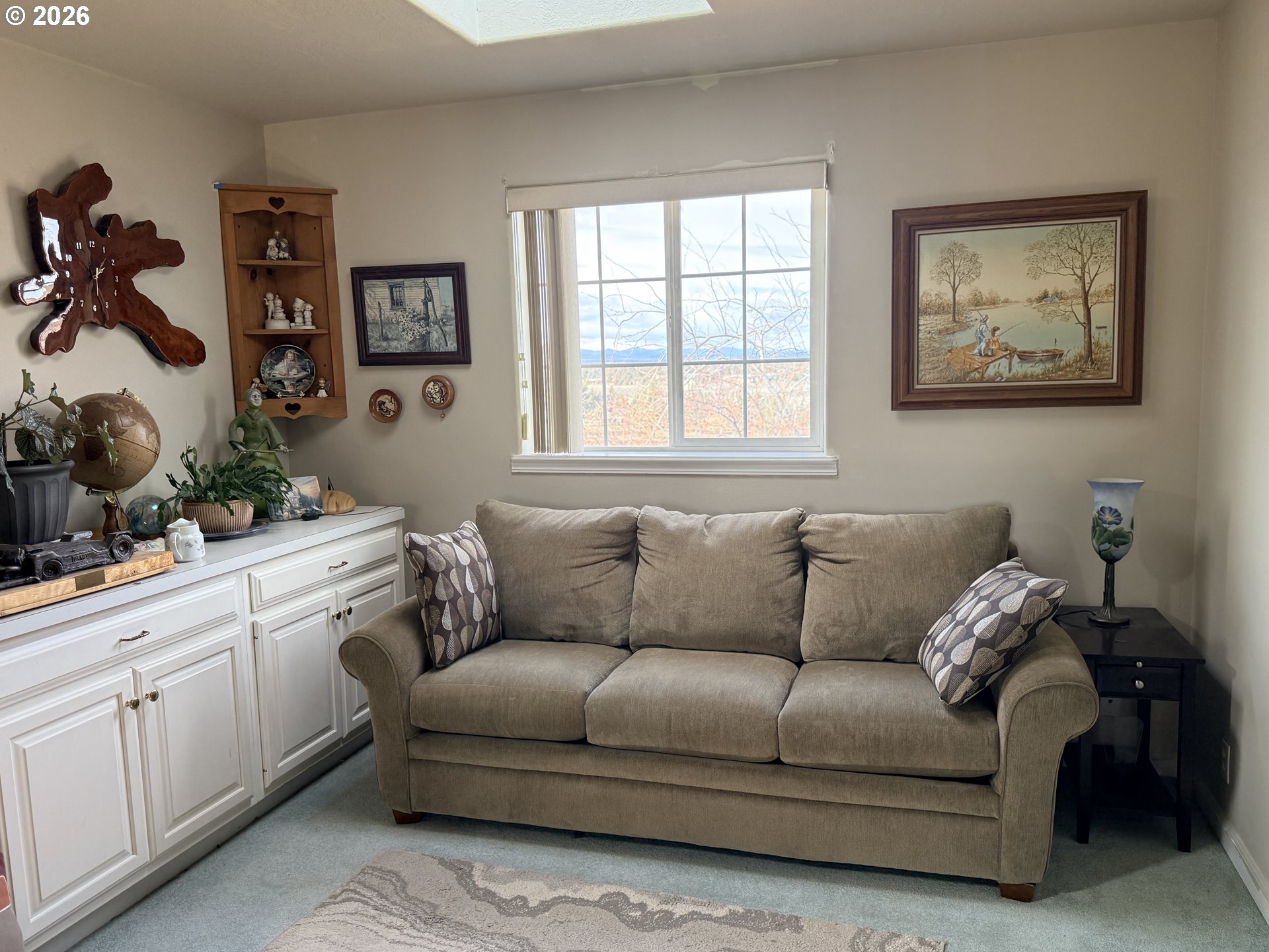 8818 Southwest Panorama Road Terrebonne, OR 97760 - Photo 12 of 46 a living room with furniture and a window