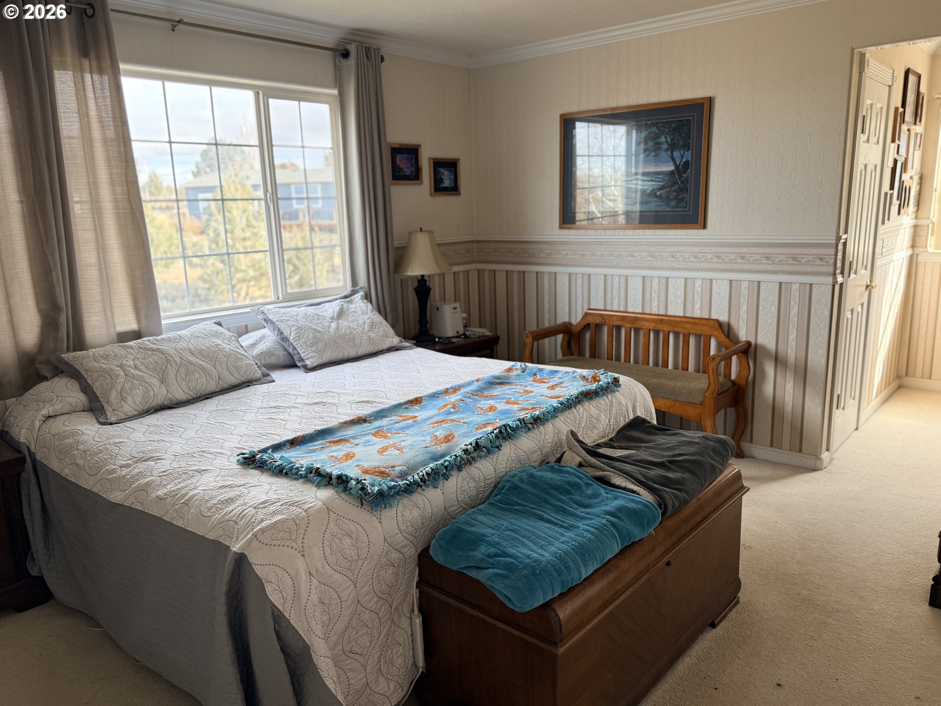 8818 Southwest Panorama Road Terrebonne, OR 97760 - Photo 13 of 46 a bedroom with a bed and a window