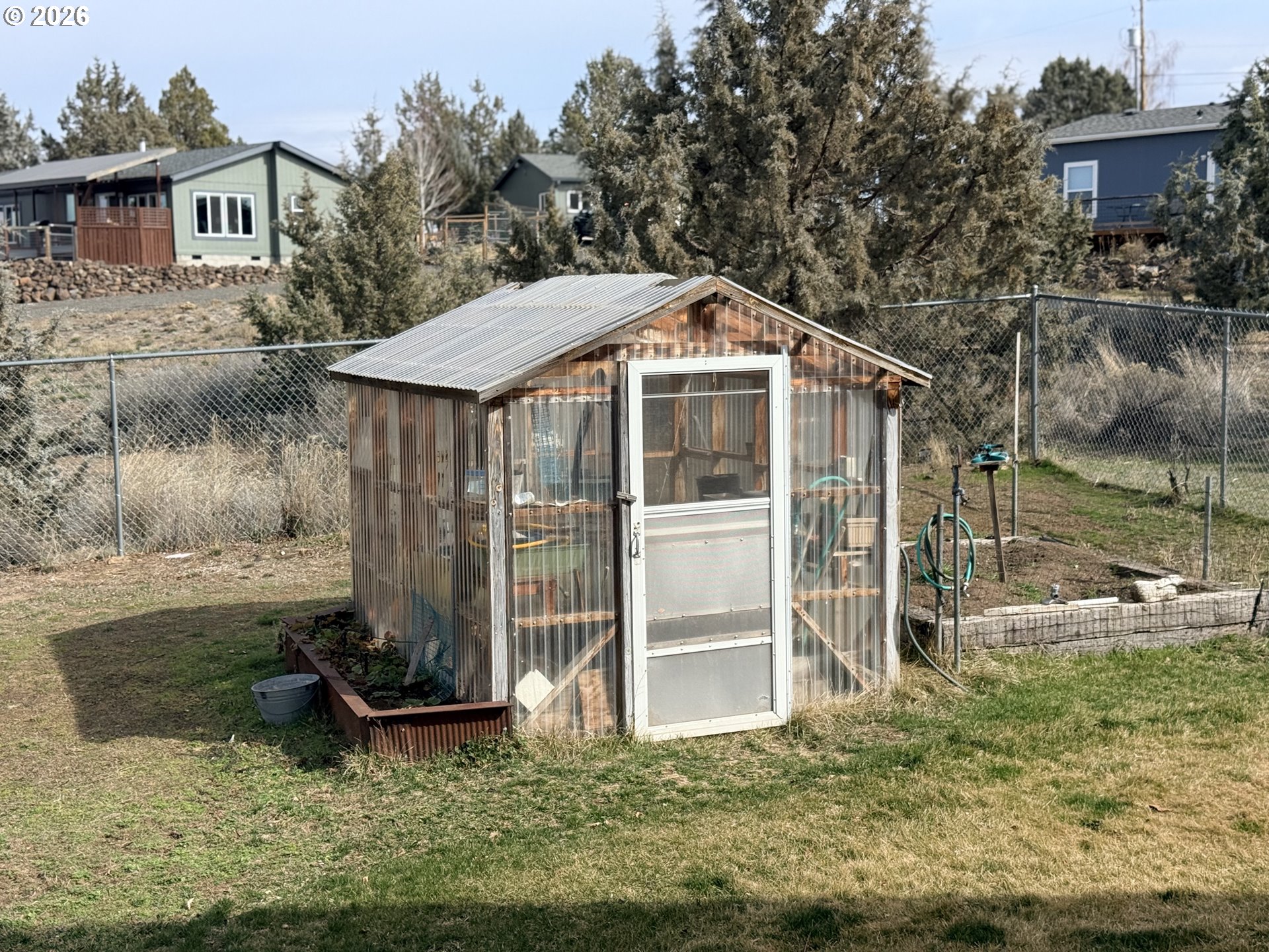 8818 Southwest Panorama Road Terrebonne, OR 97760 - Photo 15 of 46 a front view of a house with a yard