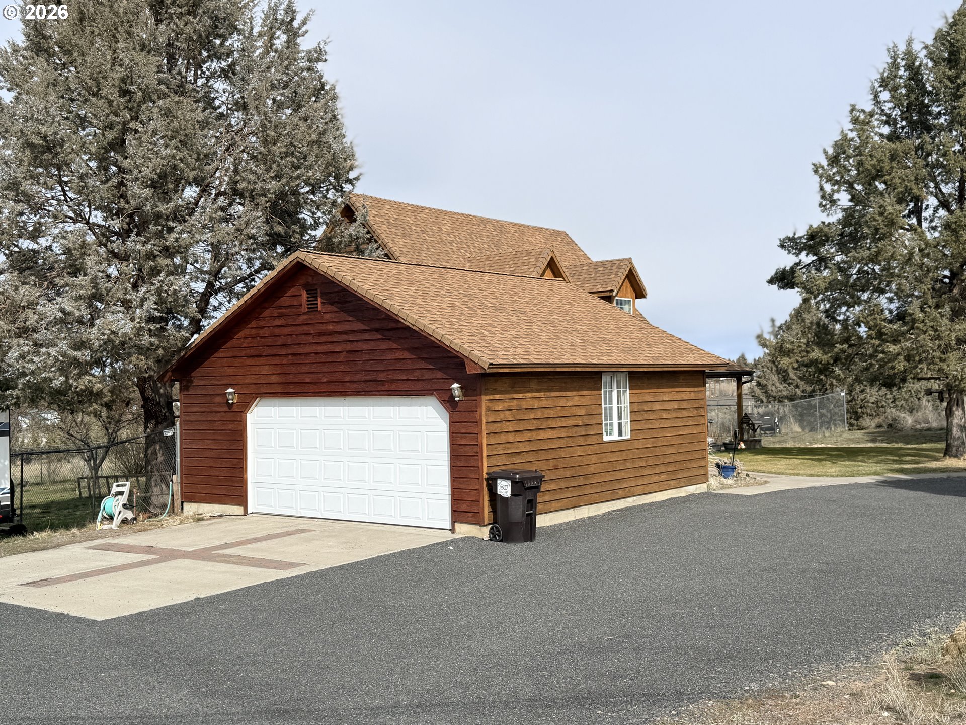 8818 Southwest Panorama Road Terrebonne, OR 97760 - Photo 3 of 46 a view of garage and yard
