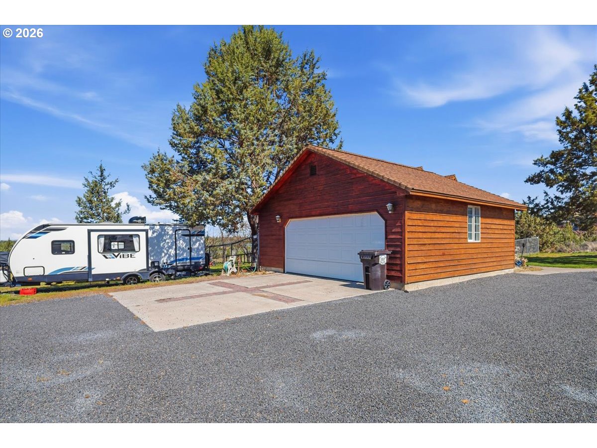 8818 Southwest Panorama Road Terrebonne, OR 97760 - Photo 38 of 46 a view of a house with a yard