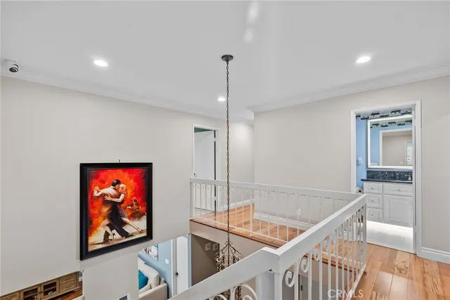 a bathroom with a granite countertop sink mirror vanity and toilet