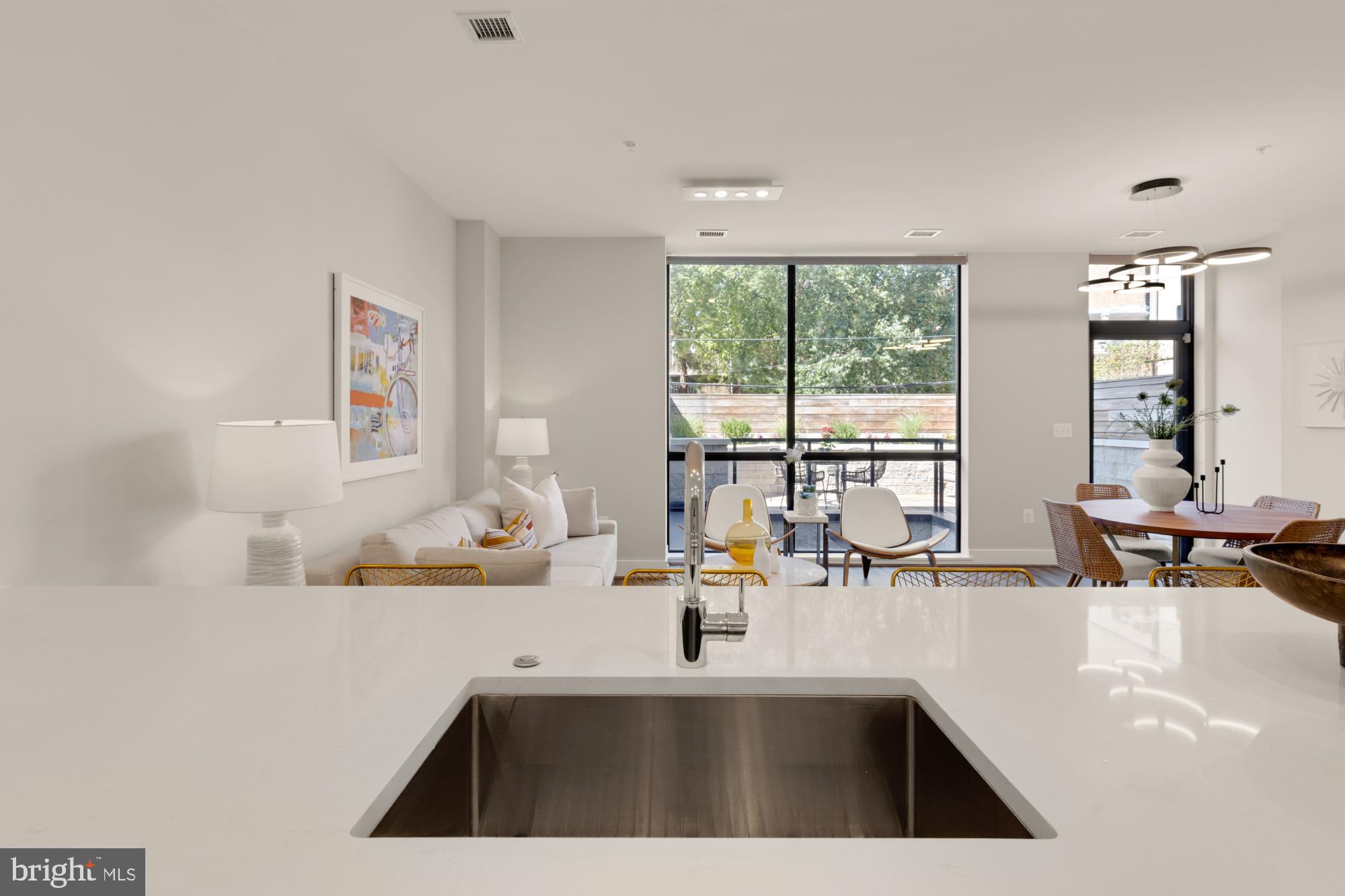 1628 11th Street Northwest, Unit 105 Washington, DC 20001 - Photo 11 of 55 a kitchen with a sink and a large window