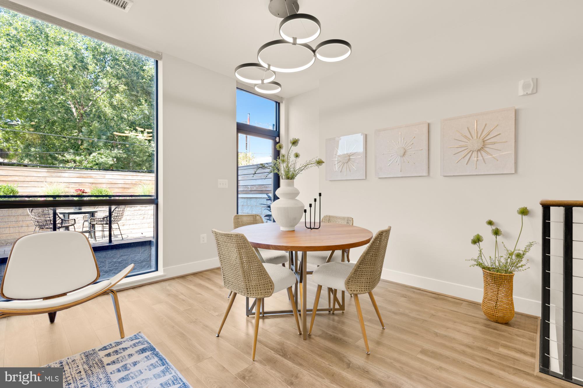 1628 11th Street Northwest, Unit 105 Washington, DC 20001 - Photo 17 of 55 a view of a dining room with furniture window and wooden floor