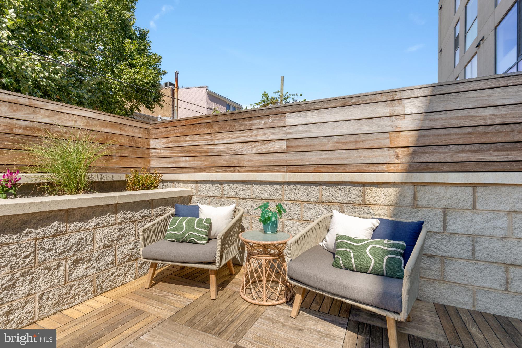 1628 11th Street Northwest, Unit 105 Washington, DC 20001 - Photo 22 of 55 a view of a chair and table on the terrace