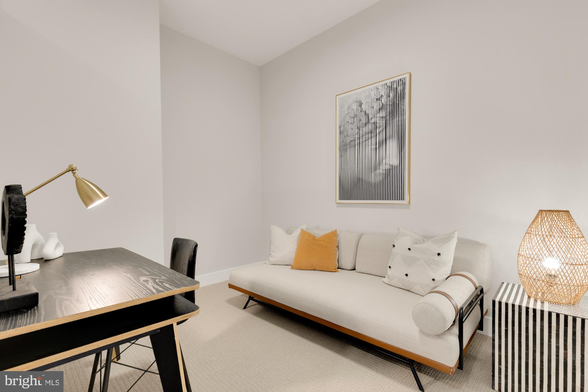 1628 11th Street Northwest, Unit 105 Washington, DC 20001 - Photo 29 of 55 a bedroom with a bed and a desk