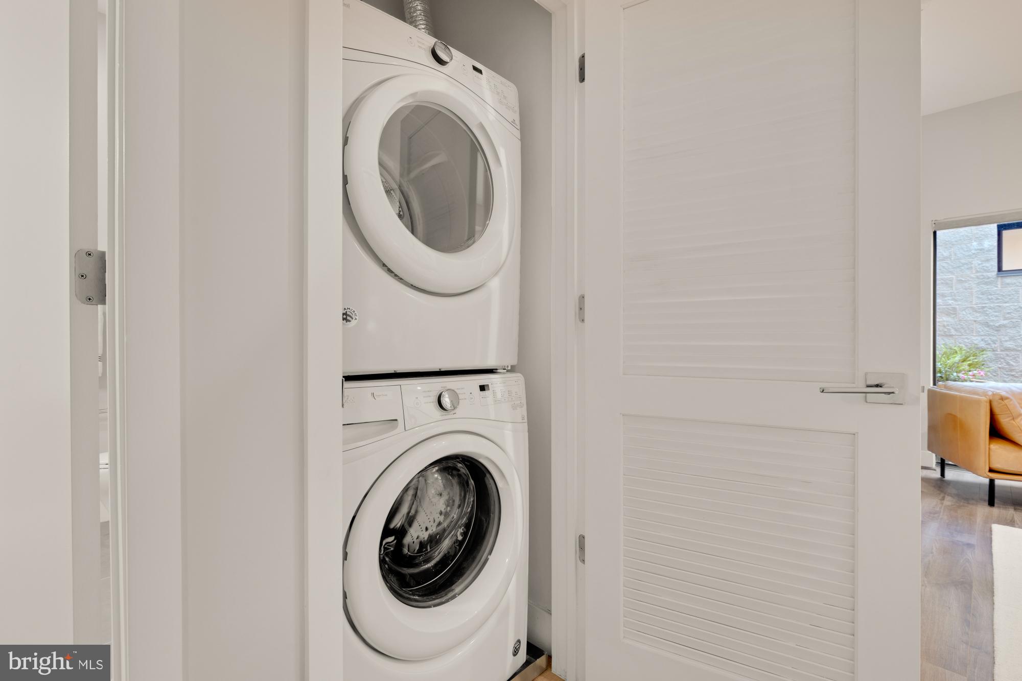 1628 11th Street Northwest, Unit 105 Washington, DC 20001 - Photo 31 of 55 a utility room with dryer and washer