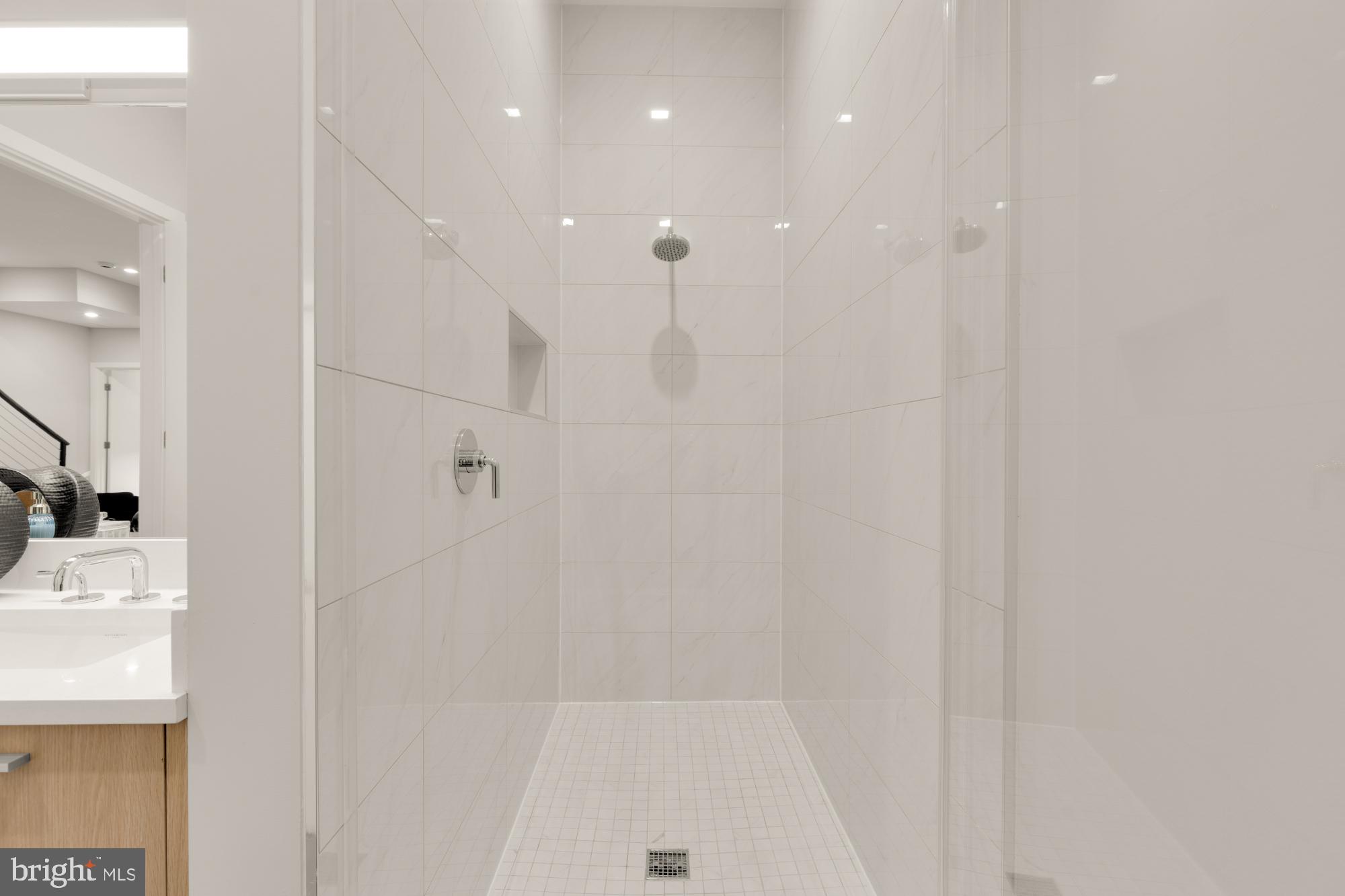 1628 11th Street Northwest, Unit 105 Washington, DC 20001 - Photo 37 of 55 a bathroom with a bathtub and shower