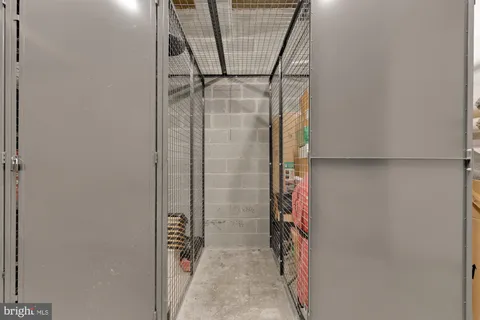 a room with gym equipment and a large window