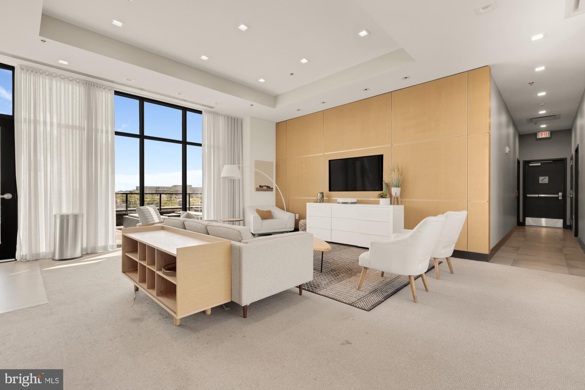 1628 11th Street Northwest, Unit 105 Washington, DC 20001 - Photo 47 of 55 a large room with a large window and furniture
