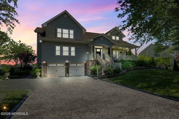a kitchen with stainless steel appliances granite countertop a stove oven and a refrigerator