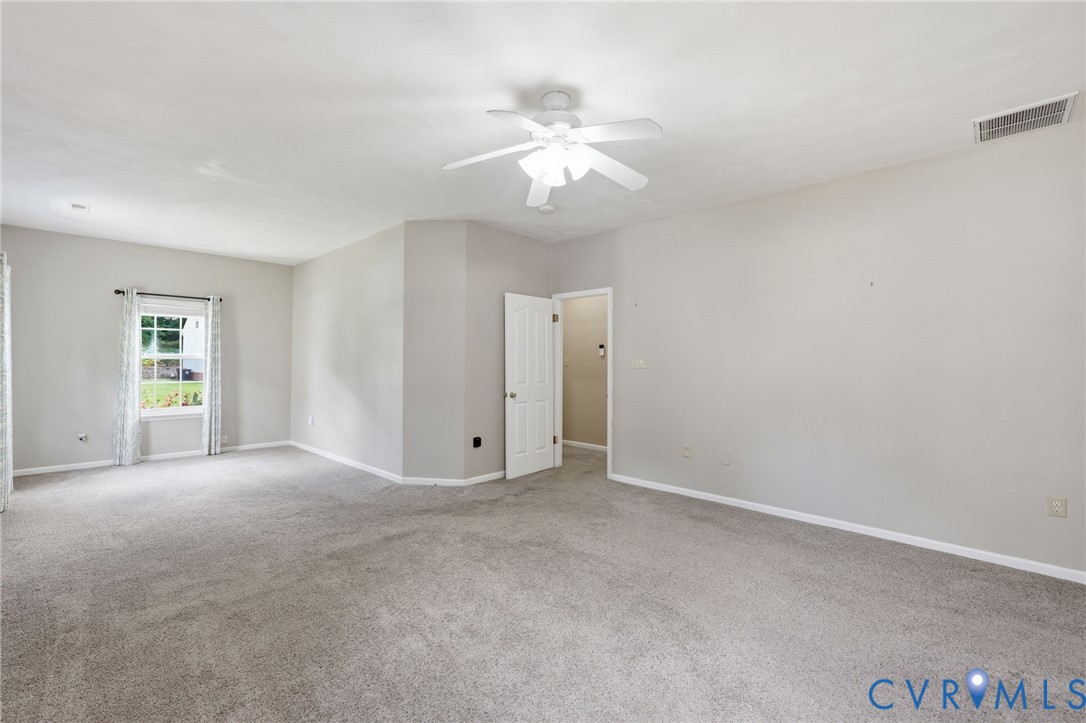 14719 Clover Ridge Lane Chesterfield, VA 23832 - Photo 16 of 36 Spacious room featuring neutral carpeting, light-t