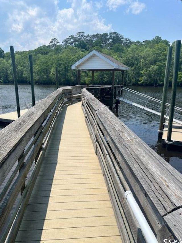 111 Rose Water Loop Myrtle Beach, SC 29588 - Photo 36 of 39 Dock area with a water view and a view of trees