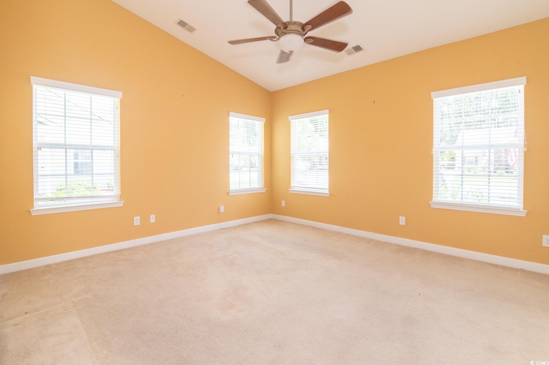 111 Rose Water Loop Myrtle Beach, SC 29588 - Photo 10 of 39 Unfurnished room with a ceiling fan, healthy amoun