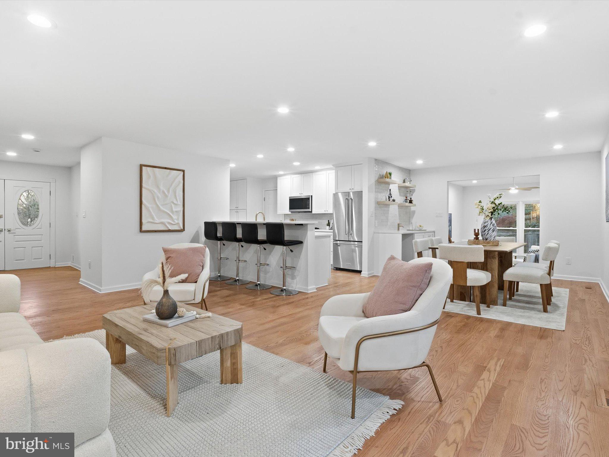 2133 Freda Drive Vienna, VA 22181 - Photo 1 of 45 a living room with furniture and kitchen view