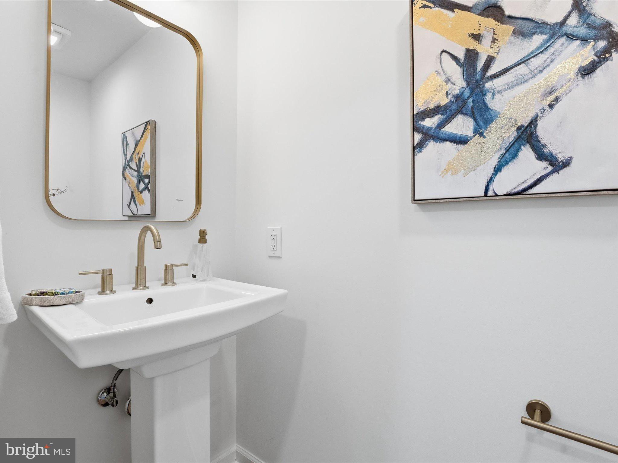 2133 Freda Drive Vienna, VA 22181 - Photo 14 of 45 a bathroom with a sink and a mirror