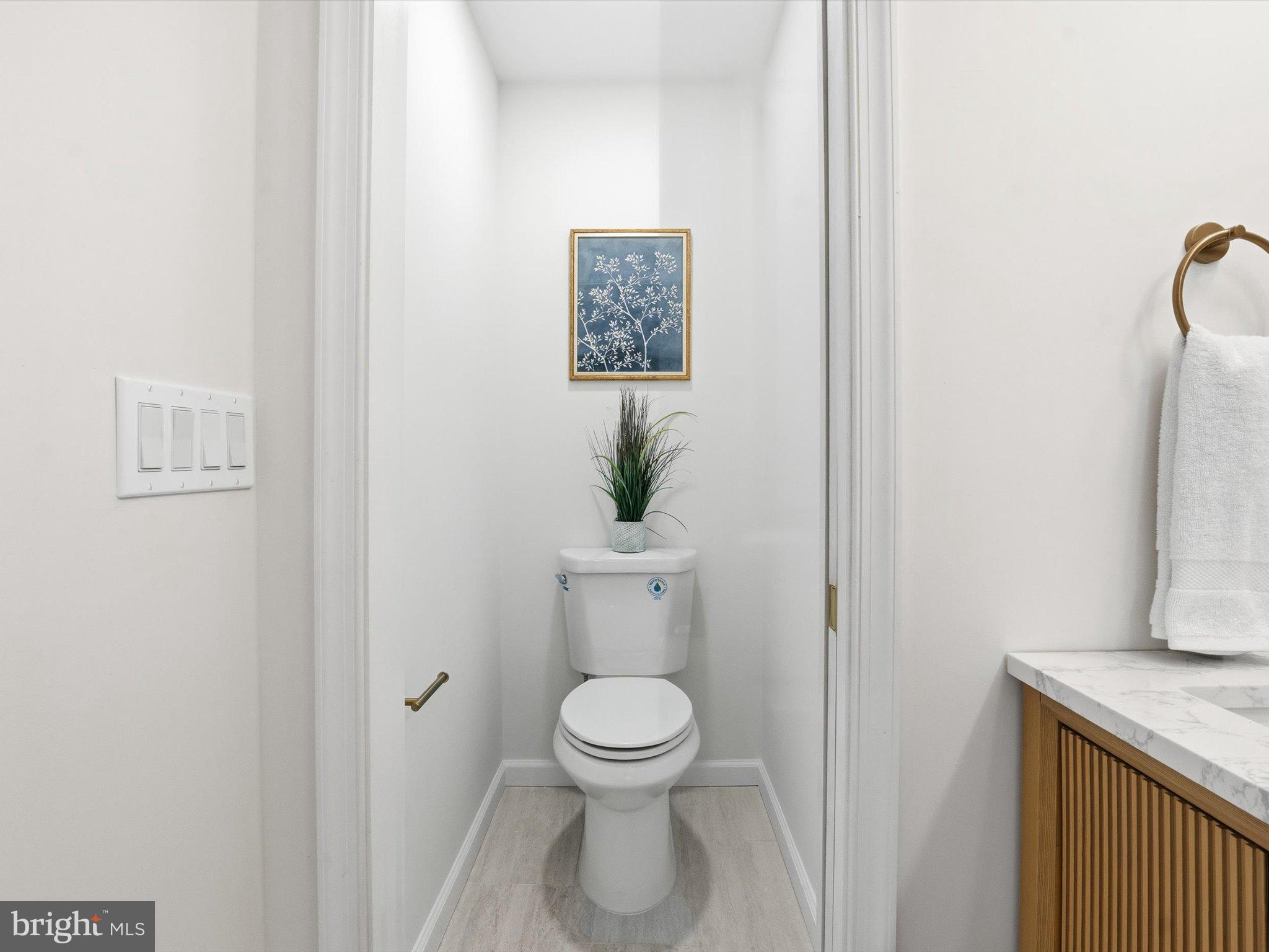 2133 Freda Drive Vienna, VA 22181 - Photo 37 of 45 a bathroom with a toilet a sink and mirror
