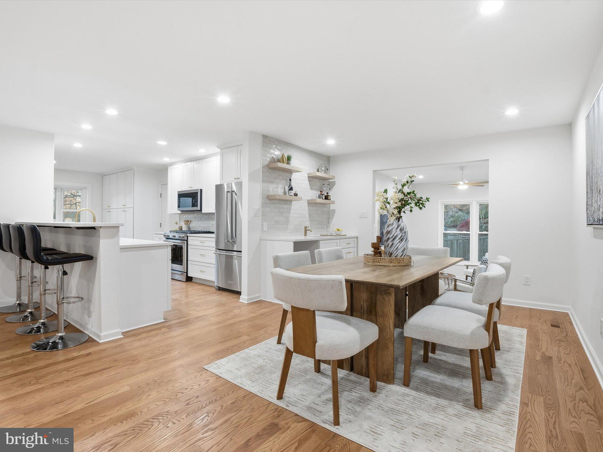 2133 Freda Drive Vienna, VA 22181 - Photo 8 of 45 a large kitchen with a table and chairs
