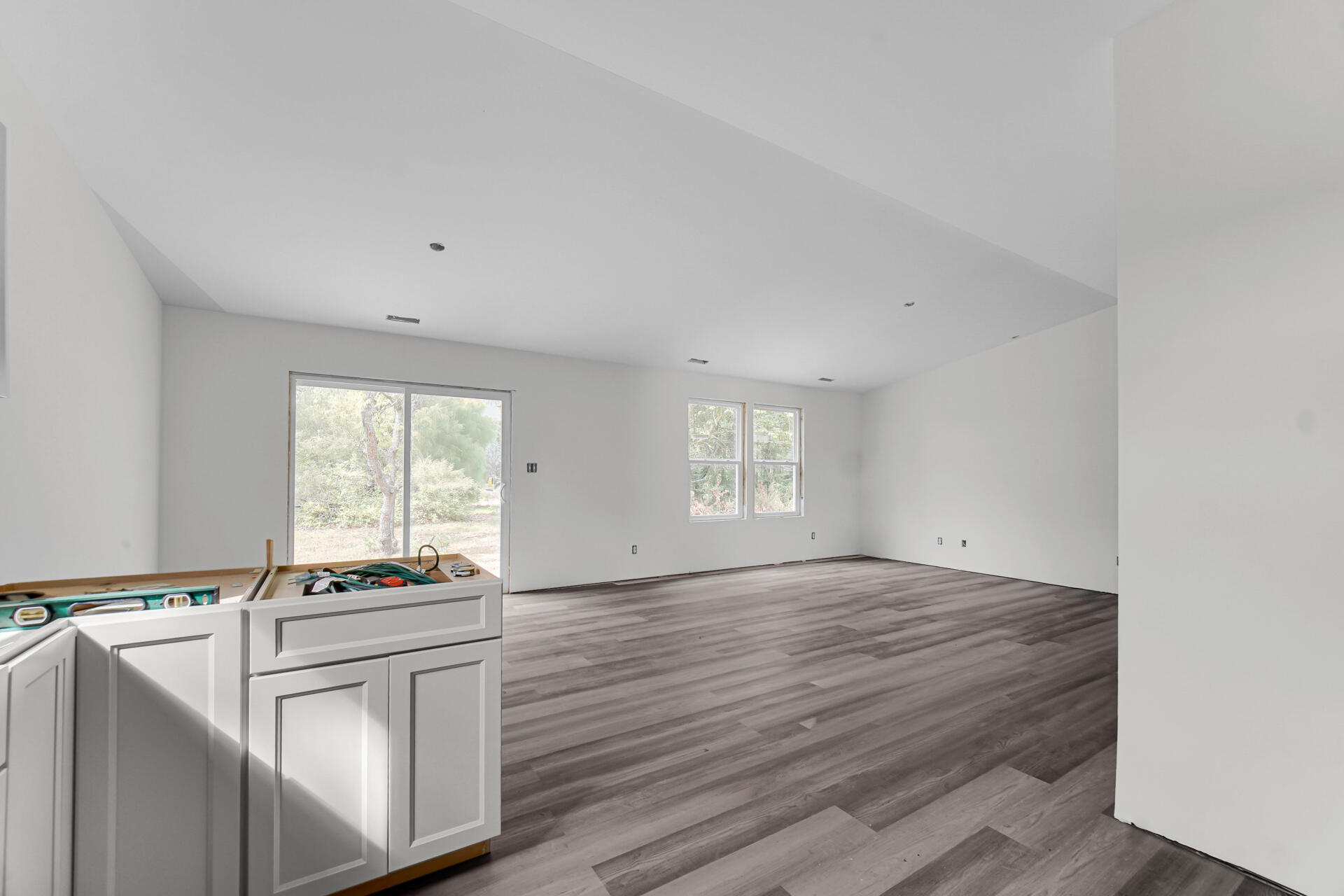 303 Malvern Road Kingsford Heights, IN 46346 - Photo 4 of 9 a view of kitchen with granite countertop cabinets appliances and a window