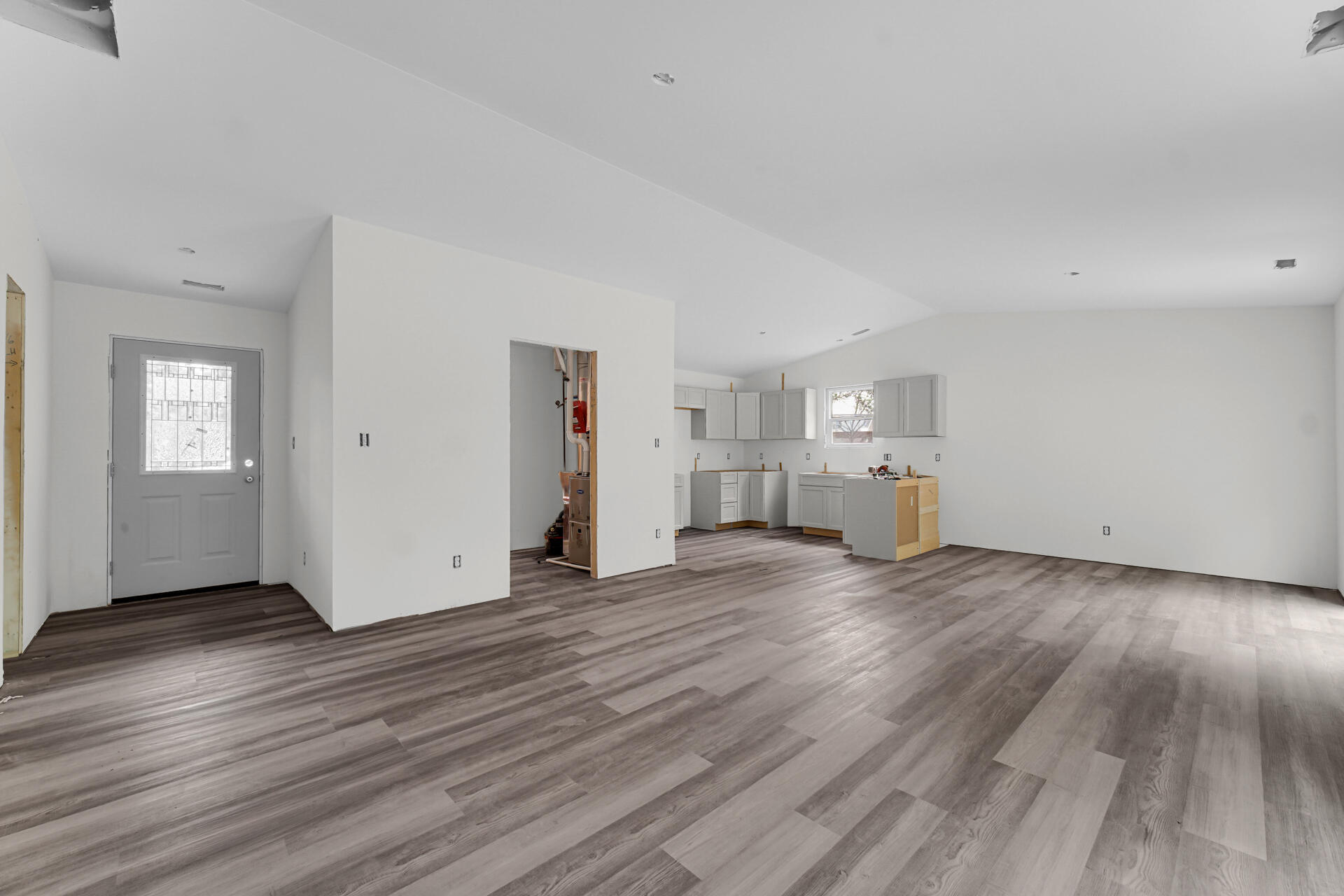 303 Malvern Road Kingsford Heights, IN 46346 - Photo 7 of 9 a view of empty room with wooden floor
