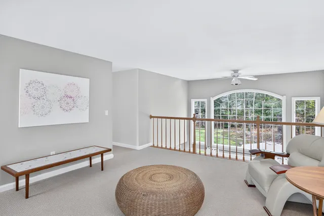 a picture of a room with a floor to a white wall