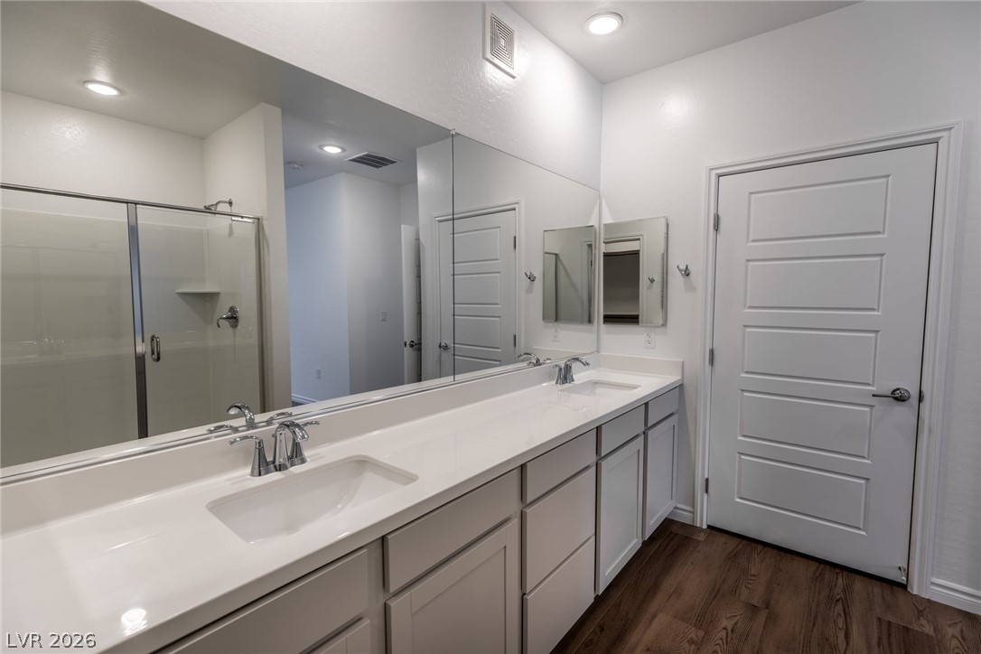 2555 Hampton Road, Unit 8206 Henderson, NV 89052 - Photo 16 of 35 This clean and bright bathroom features dual vanities and a spacious shower.