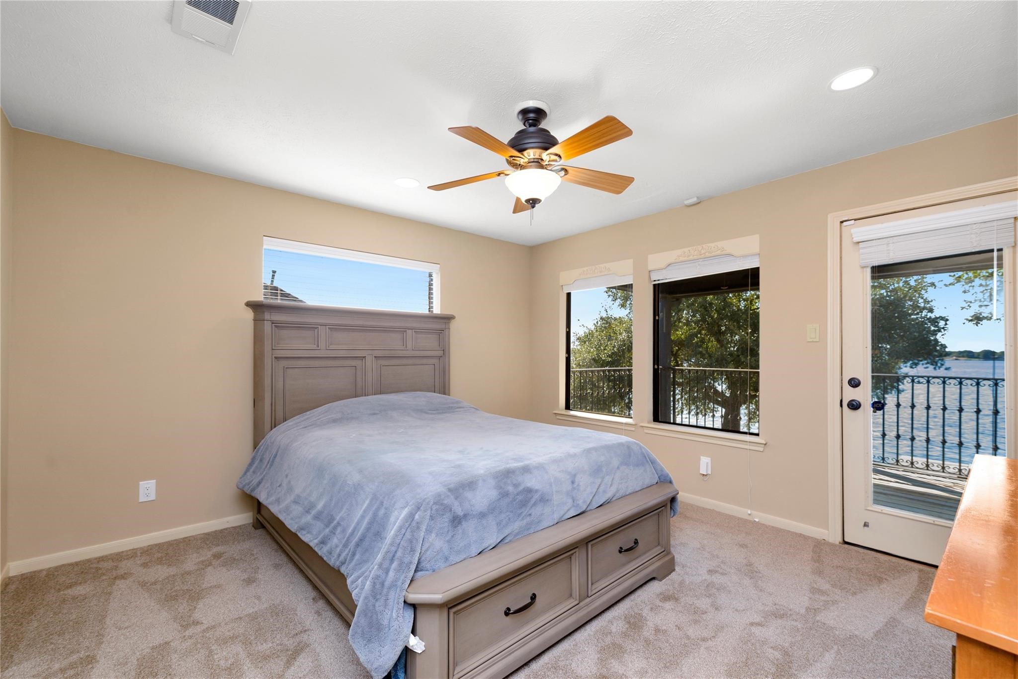 12098 Sagittarius East Willis, TX 77318 - Photo 26 of 37 a bedroom with a bed and window