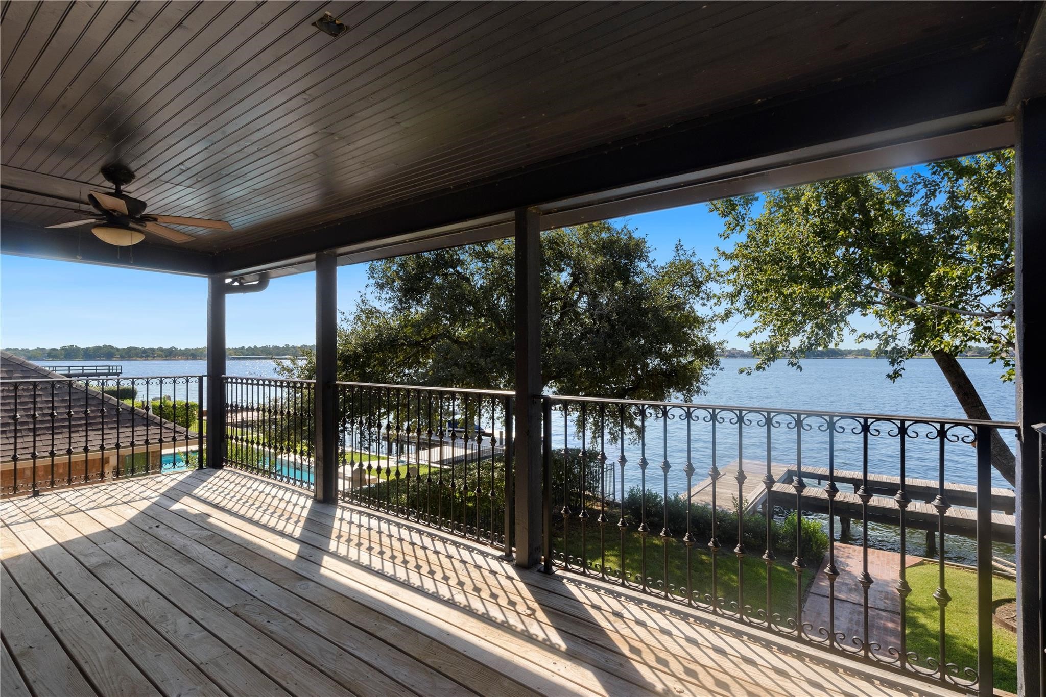 12098 Sagittarius East Willis, TX 77318 - Photo 27 of 37 a view of a balcony with wooden floor