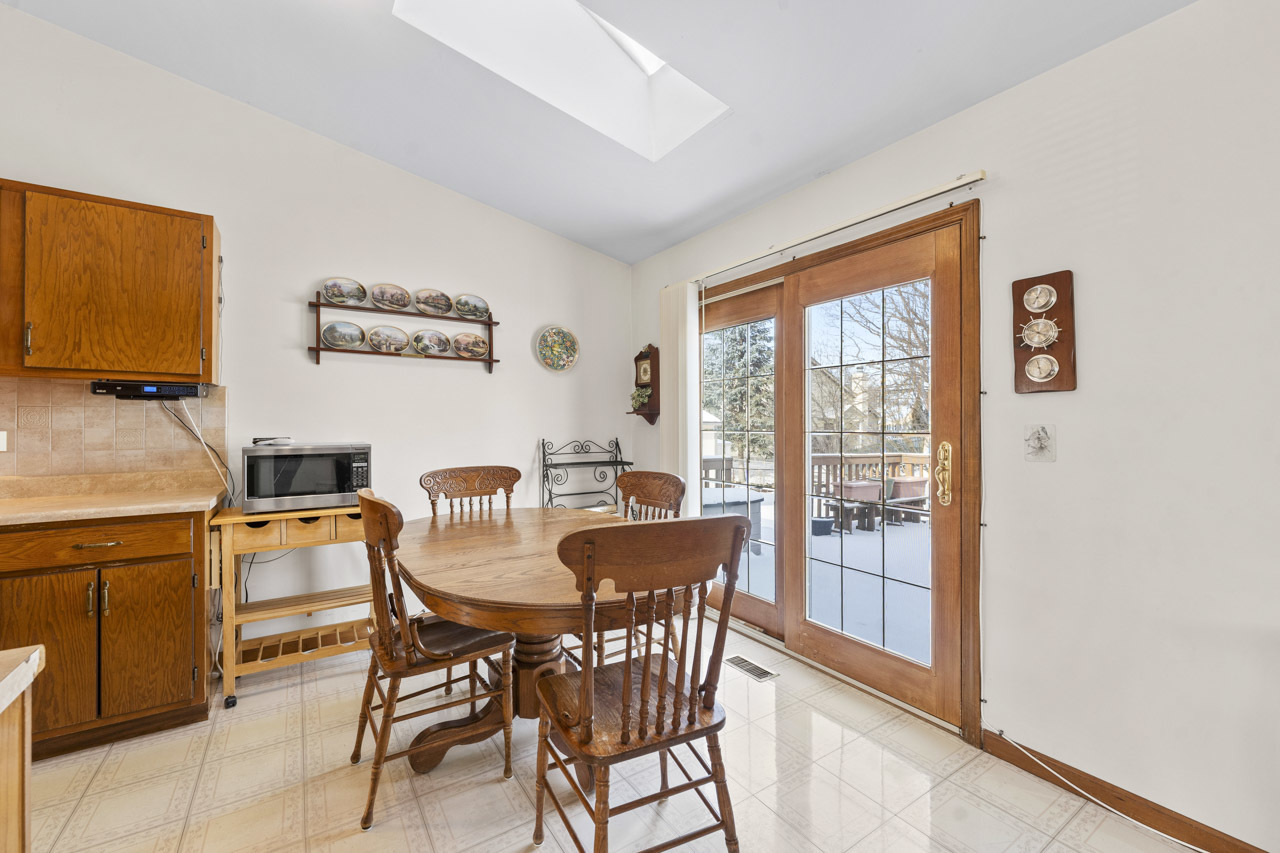 1106 Pheasant Trail Carol Stream, IL 60188 - Photo 12 of 33 a view of a dining room with furniture window and outside view