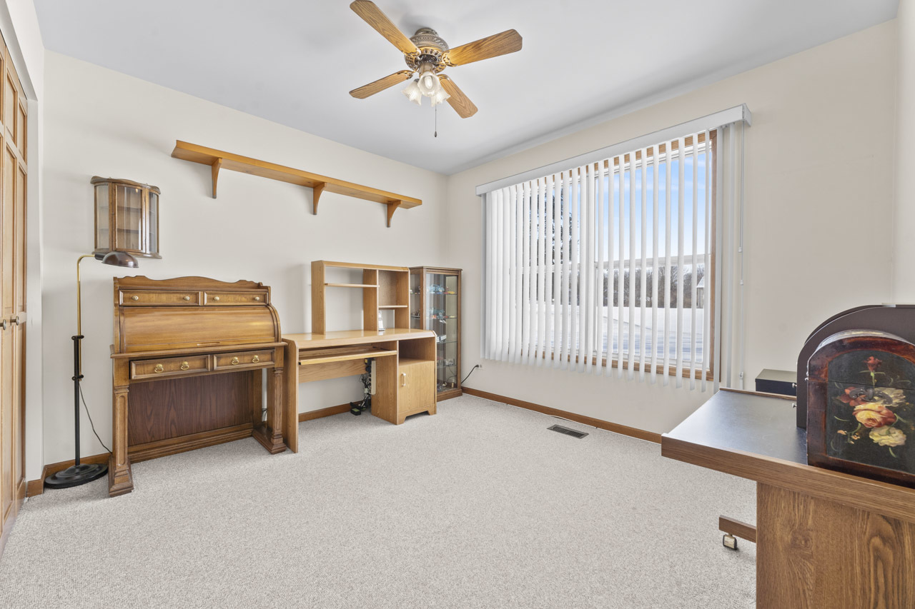 1106 Pheasant Trail Carol Stream, IL 60188 - Photo 25 of 33 a bedroom with furniture and a window