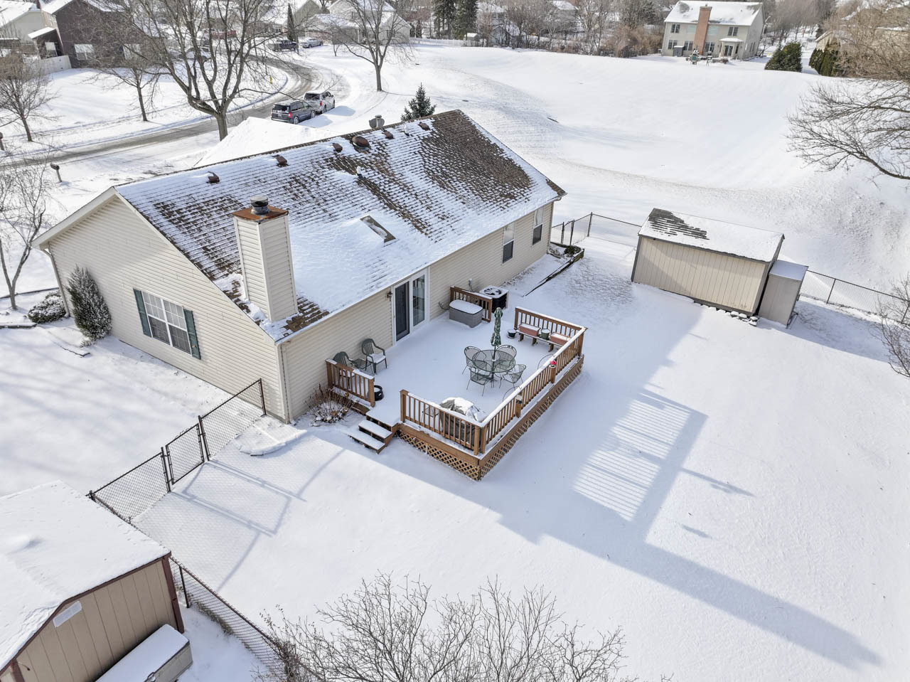 1106 Pheasant Trail Carol Stream, IL 60188 - Photo 28 of 33 a view of a roof deck with couches and wooden floor