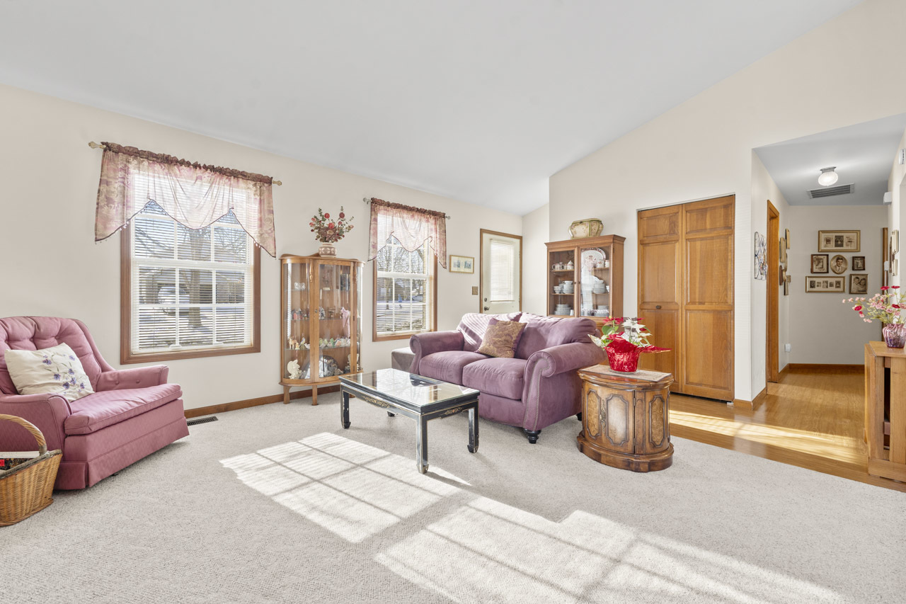 1106 Pheasant Trail Carol Stream, IL 60188 - Photo 5 of 33 a living room with furniture and a floor to ceiling window